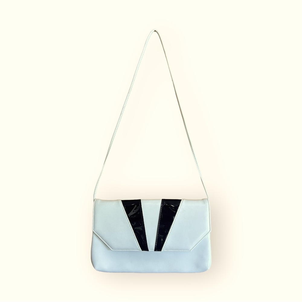 Retro leather white crossbody bag with black accents. Small envelope crossbody